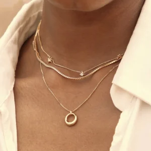 Cosmic Star Charm Necklace in Gold