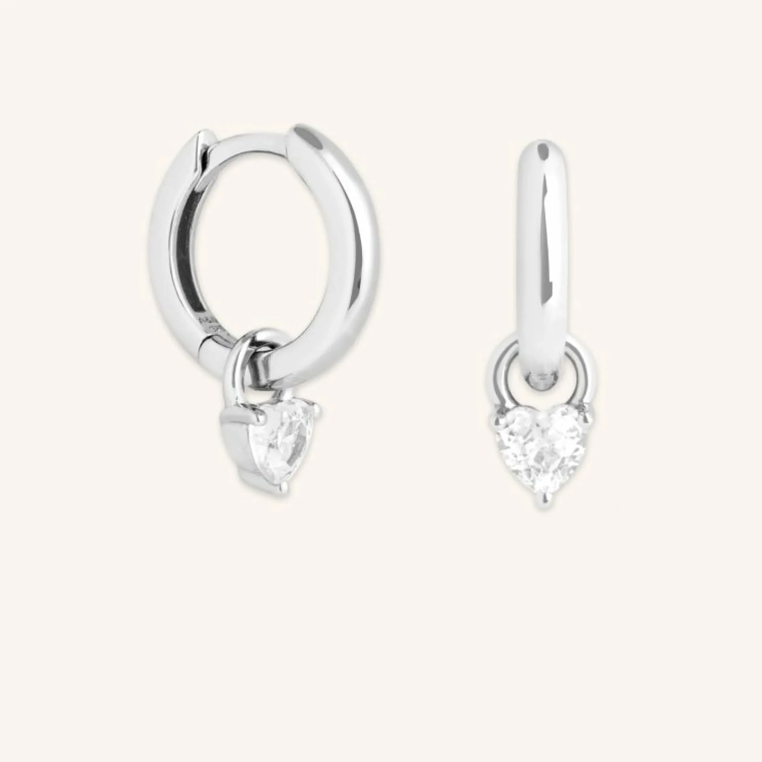 heart_crystal_charm_huggi_0-1.webp Heart Crystal Charm Huggies in Silver