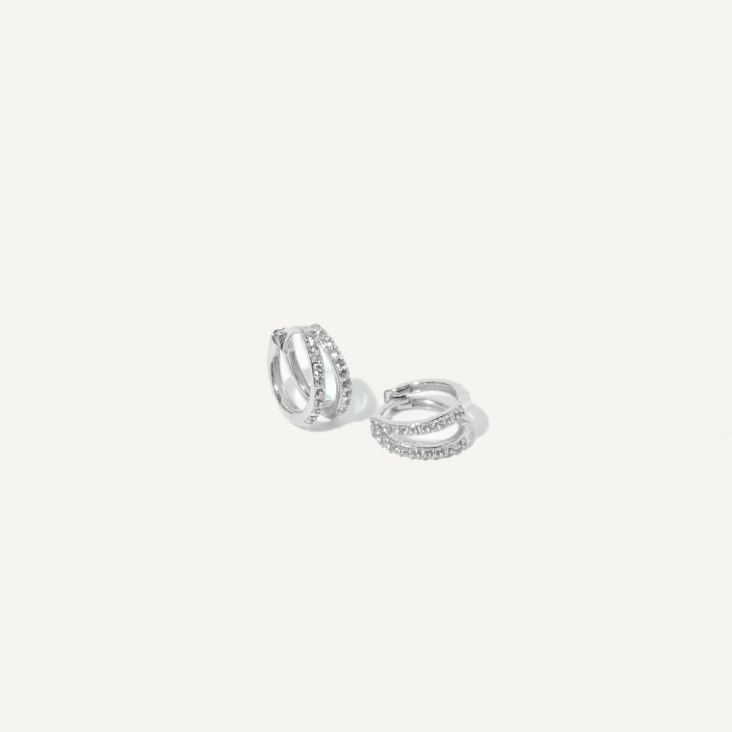 illusion_topaz_huggies_in_2-2.webp Illusion Topaz Huggies in Solid White Gold